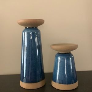 Blue and tan ceramic candle holders.